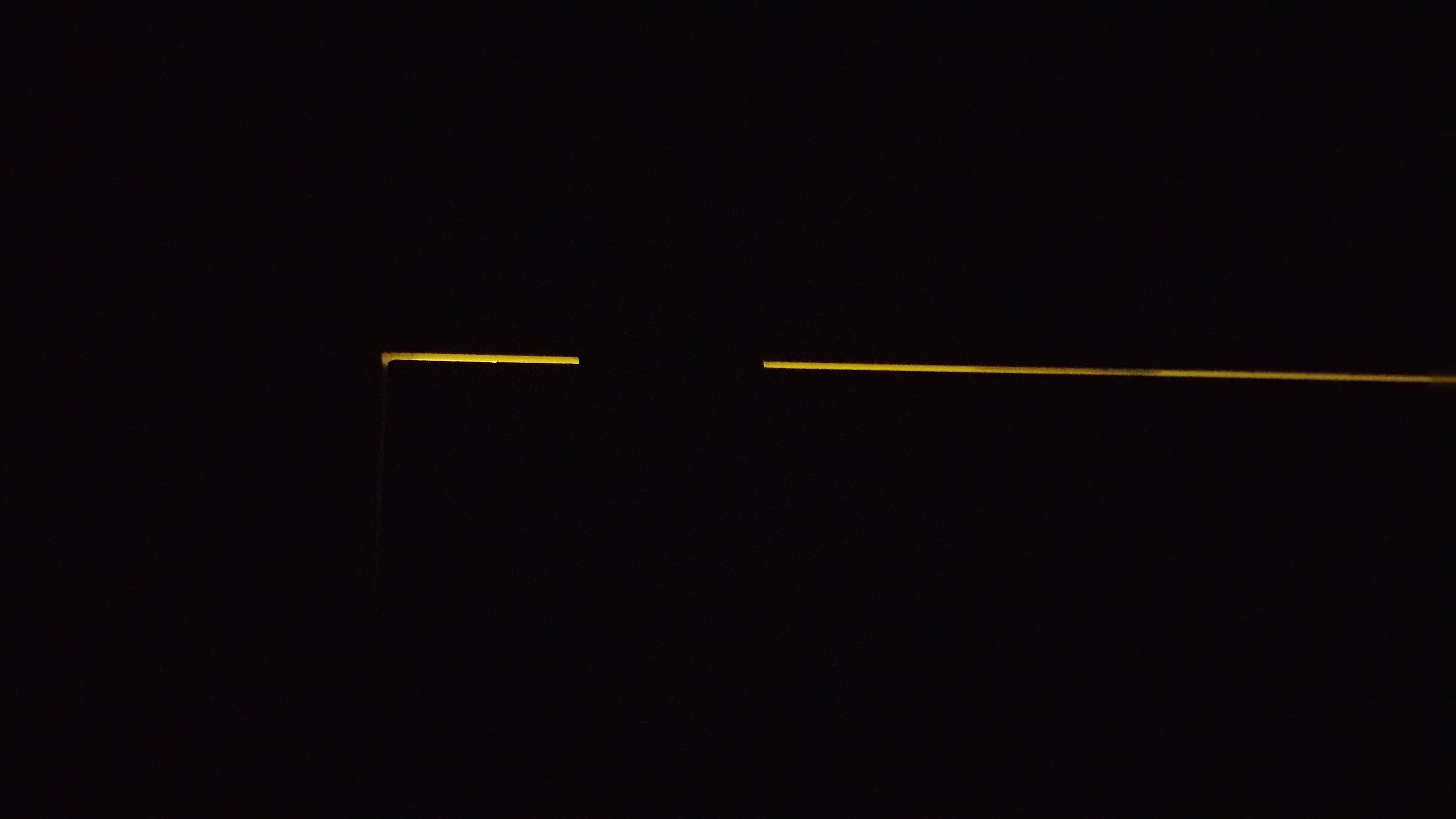Hotel room door with side gap letting in noise Light leaking from the side of a hotel room door
